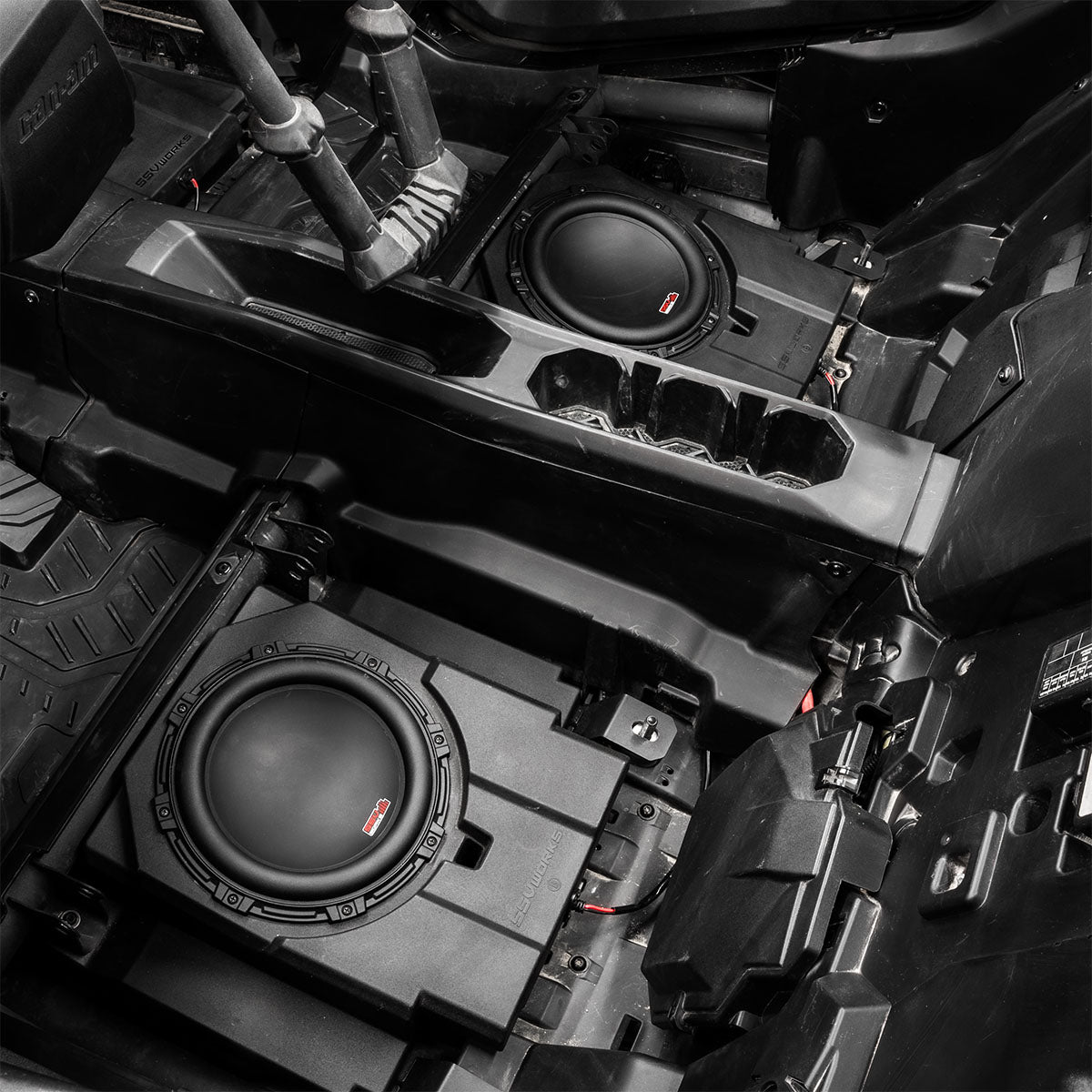 https://cdn.shopify.com/s/files/1/0528/8755/2184/files/MAVR-PHZ_BS10V_SSV_Works_Maverick_R_Rear_seat_subwoofer_install.jpg?v=1755195967