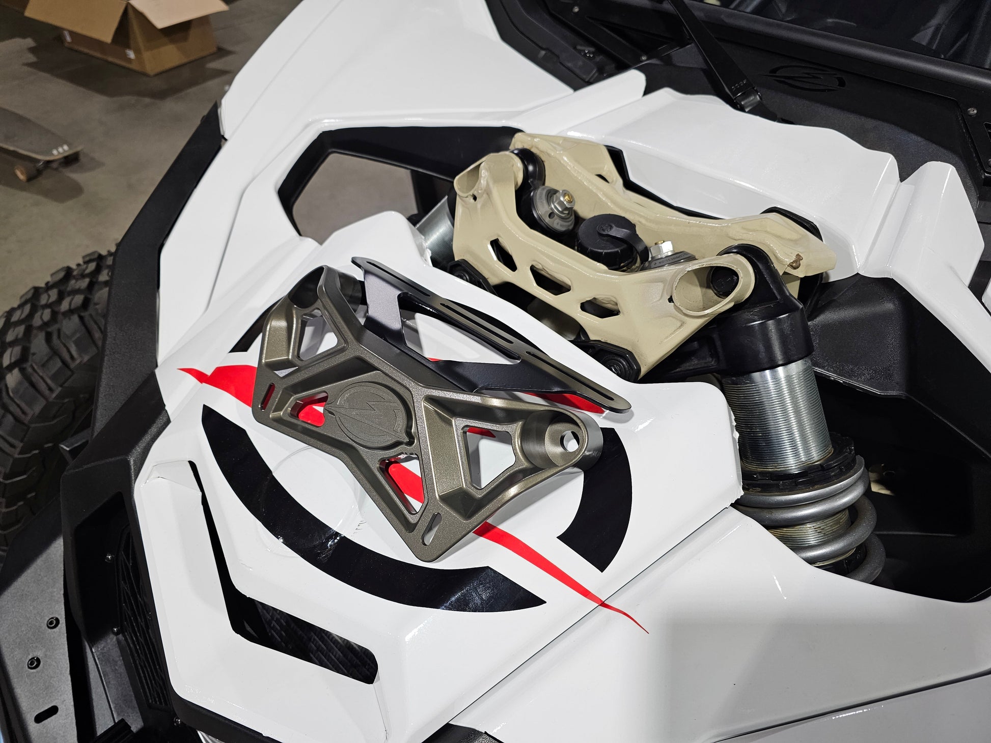 https://cdn.shopify.com/s/files/1/0749/1980/5228/files/2017_Can_Am_X3_Upper_Shock_Brace_Light_Mount_10.jpg?v=1721075710