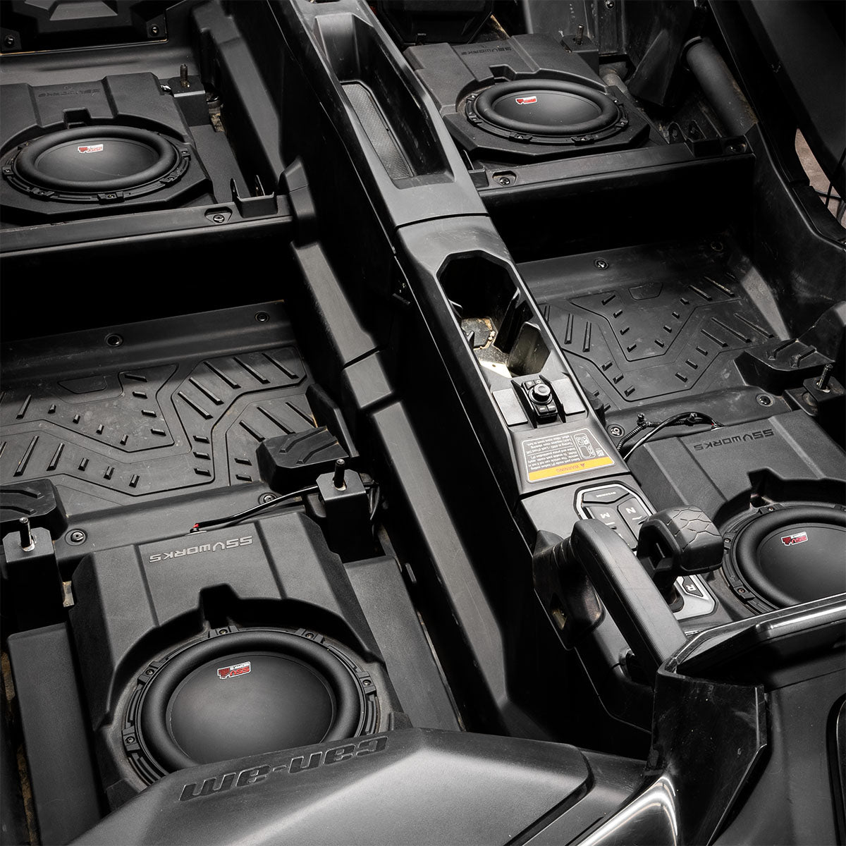 https://cdn.shopify.com/s/files/1/0528/8755/2184/files/MAVR-PHZ_BS10V_SSV_Works_Maverick_R_front_and_Rear_seat_subwoofer_install.jpg?v=1755195967