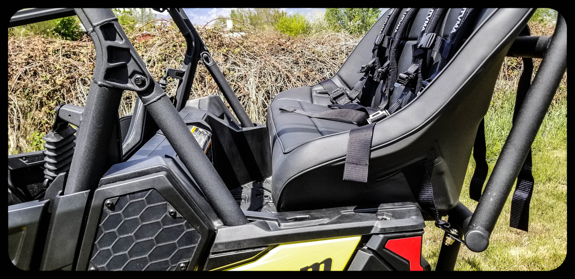https://cdn.shopify.com/s/files/1/0366/5541/products/Maverick_Trail_Rear_Seat_and_Roll_Cage_Foot_-_Leg_Room.jpg?v=1721923273