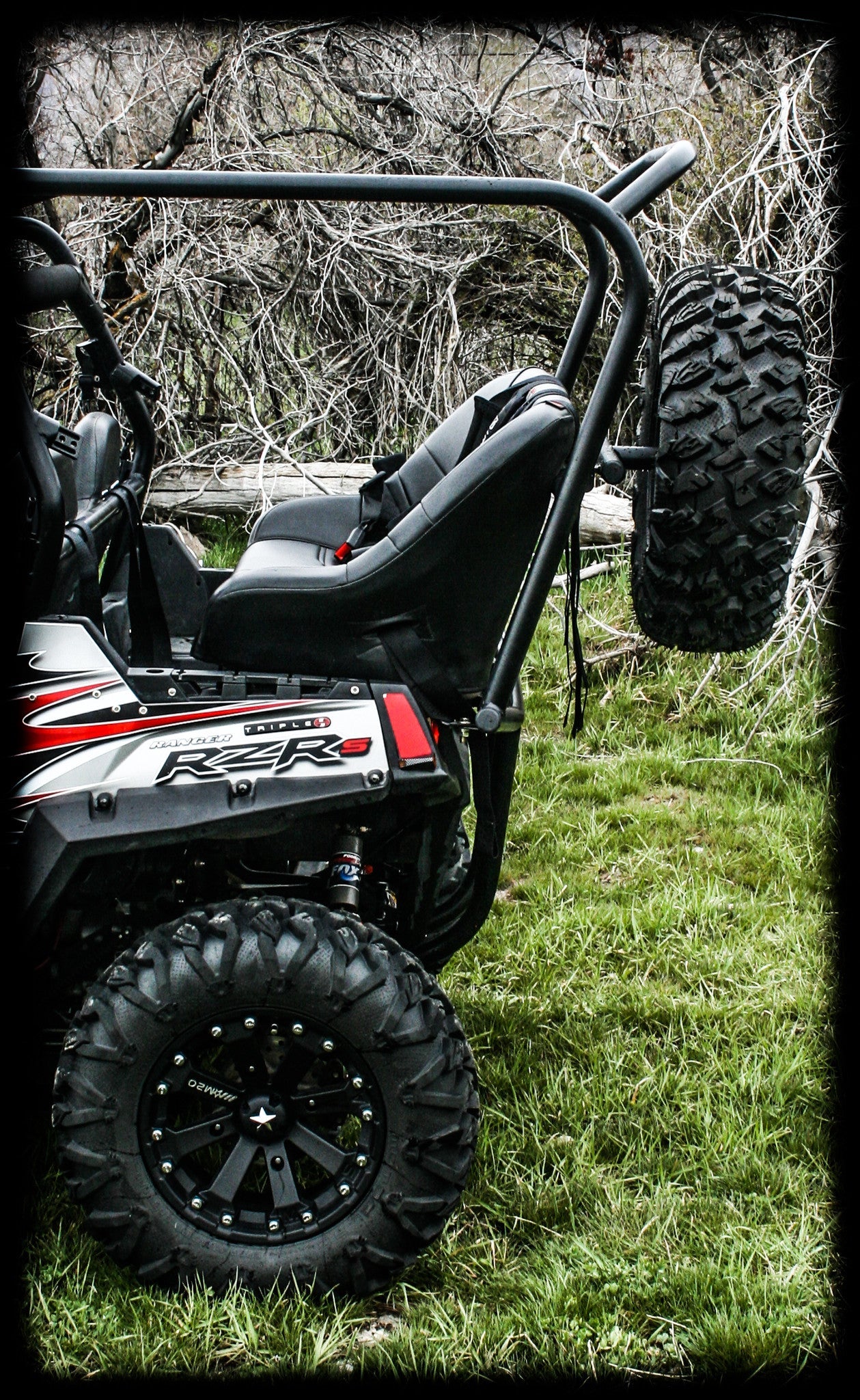 https://cdn.shopify.com/s/files/1/0366/5541/products/RZR_800_Spire_Tire_Rack_2.jpg?v=1659479501