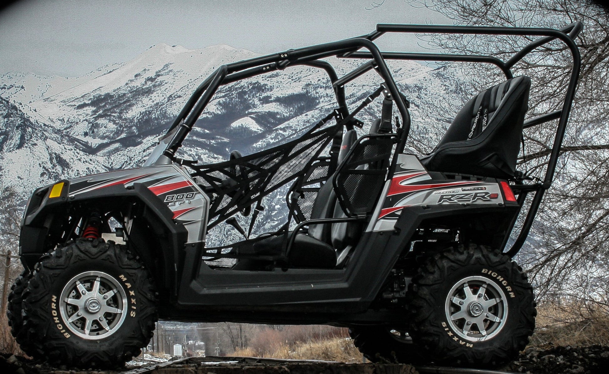 https://cdn.shopify.com/s/files/1/0366/5541/products/RZR_Bar_over_and_Soft_Top_Roof_271.jpg?v=1711382176