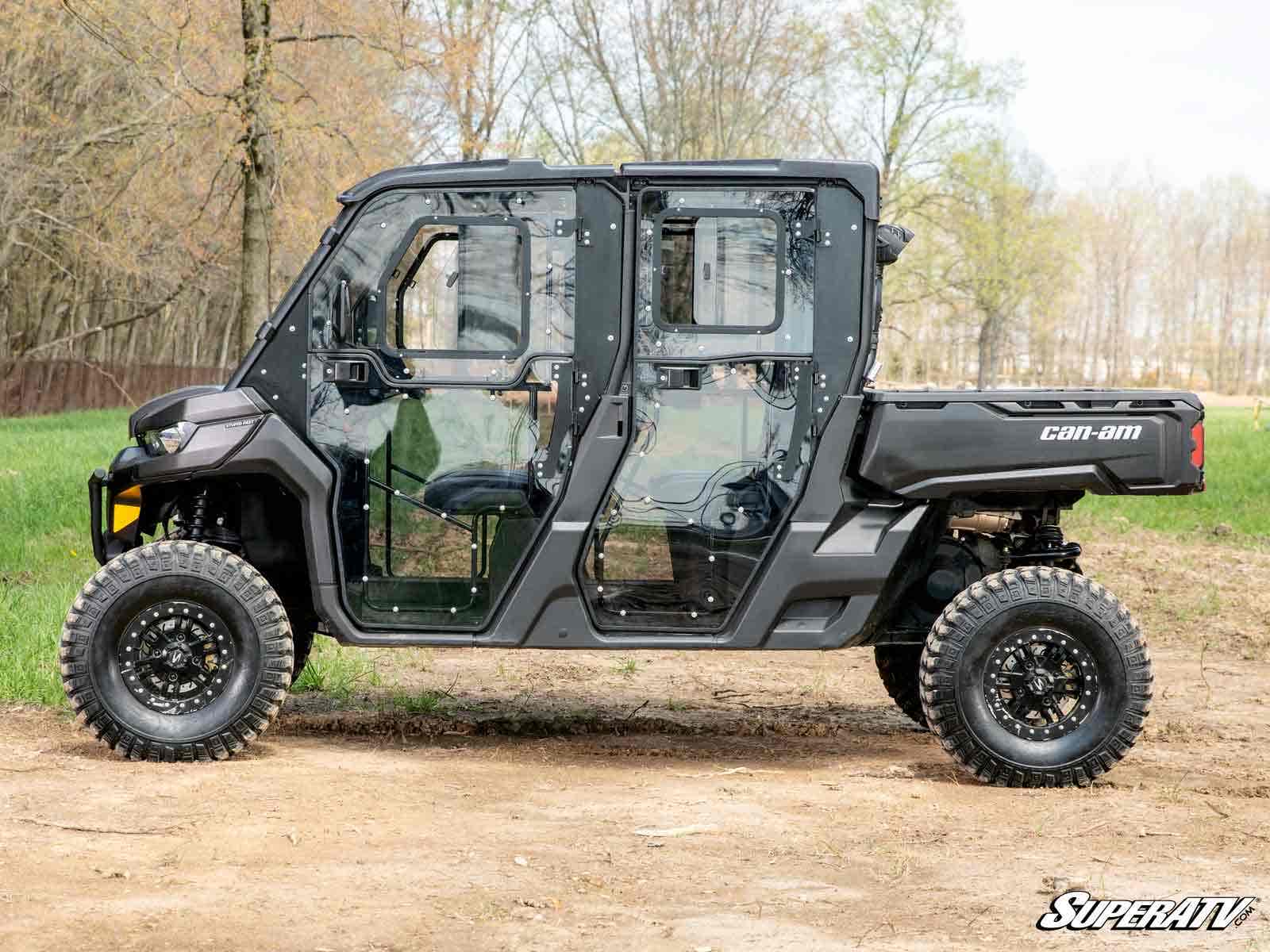 https://media.superatv.com/media/catalog/product/c/a/can-am-defender-4-full-doors_3_1.jpg?optimize=high&fit=bounds&height=&width=3840