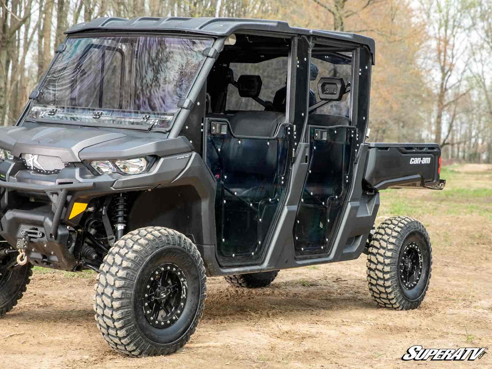 https://media.superatv.com/media/catalog/product/c/a/can-am-defender-4-full-doors_5_1.jpg?optimize=high&fit=bounds&height=&width=3840