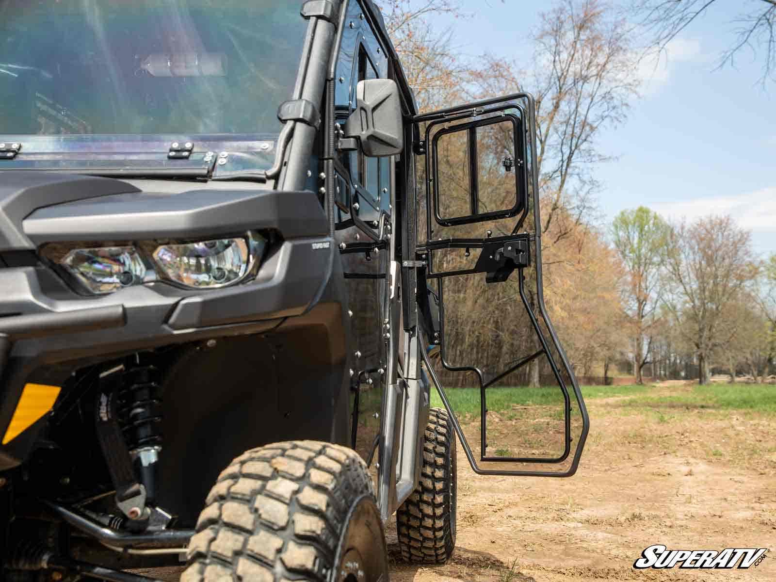 https://media.superatv.com/media/catalog/product/c/a/can-am-defender-4-full-doors_9_1_1_1.jpg?optimize=high&fit=bounds&height=&width=3840