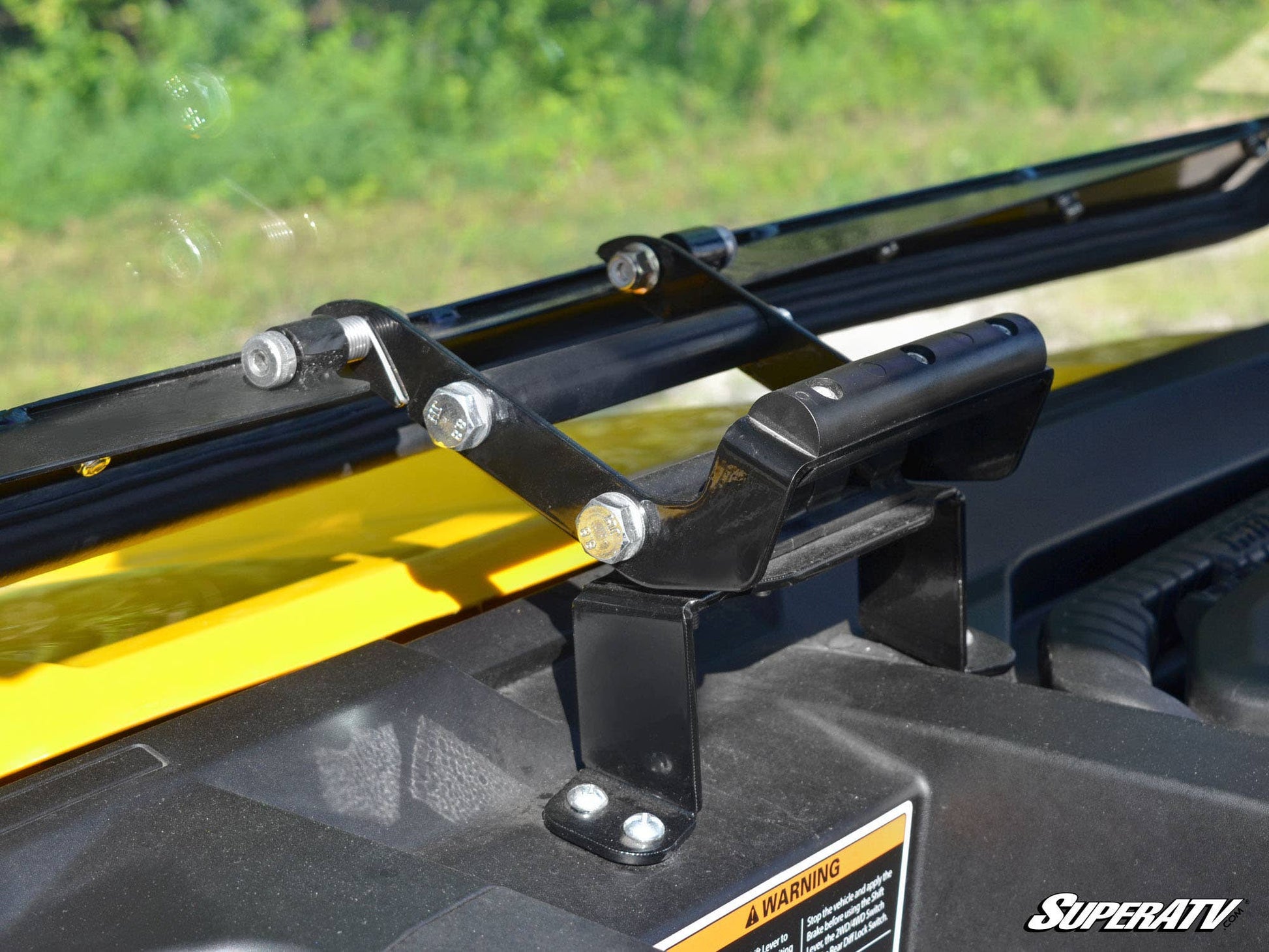 https://media.superatv.com/media/catalog/product/c/a/can-am-defender-scratch-resistant-flip-windshield-08.jpg
