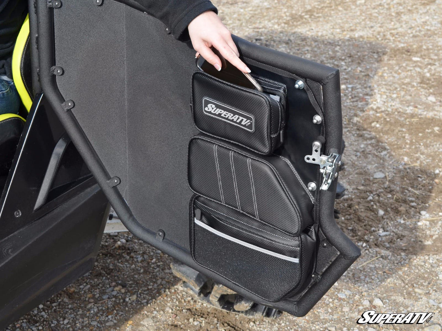 https://media.superatv.com/media/catalog/product/c/a/can-am-maverick-commander-door-bag-vby-3_3.jpg?optimize=high&fit=bounds&height=&width=