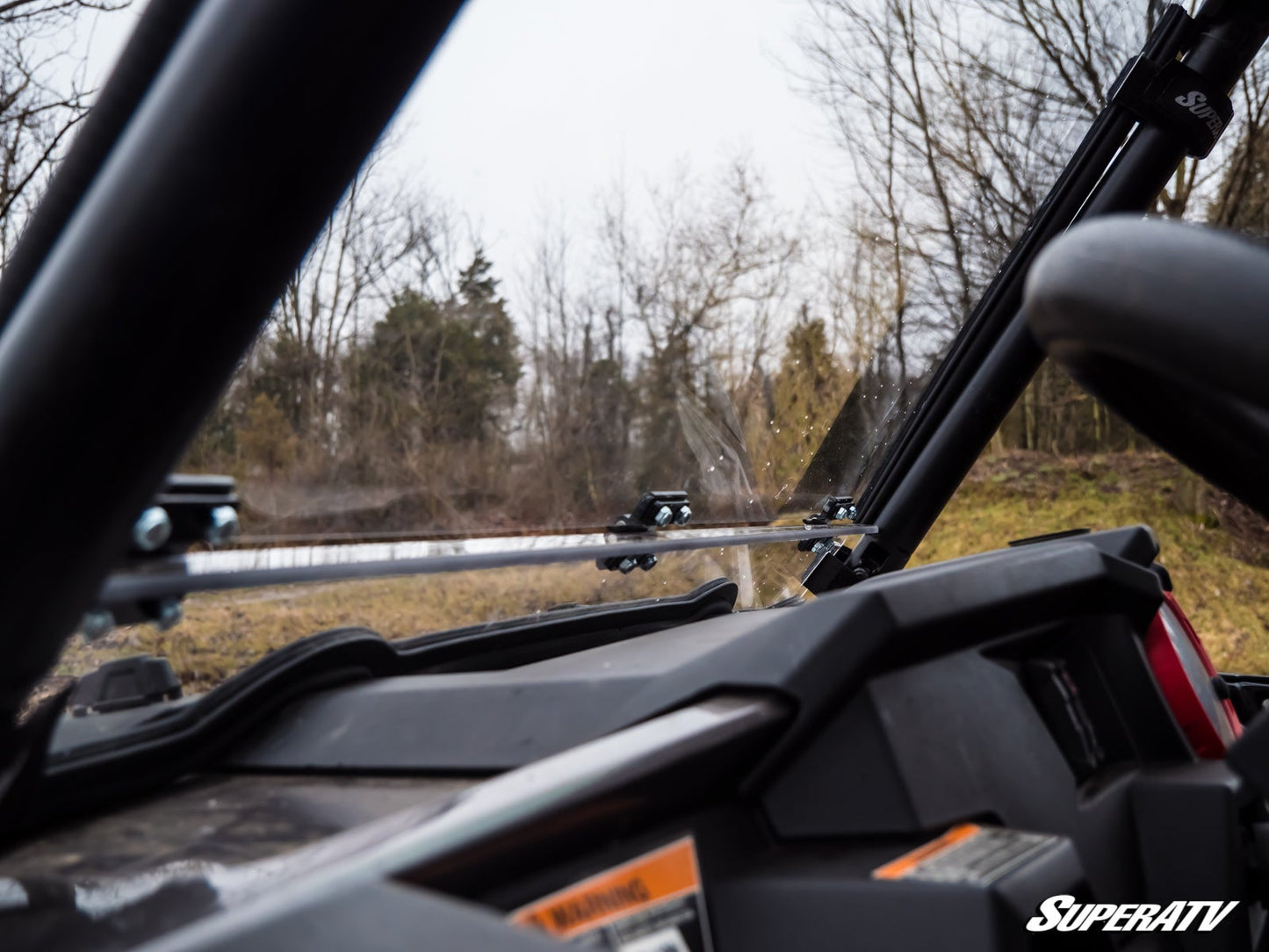 https://media.superatv.com/media/catalog/product/p/o/polaris-rzr-1000-flip-down-windshield-06_1_4.jpg?optimize=high&fit=bounds&height=&width=3840&quality=85&auto=webp&format=pjpg