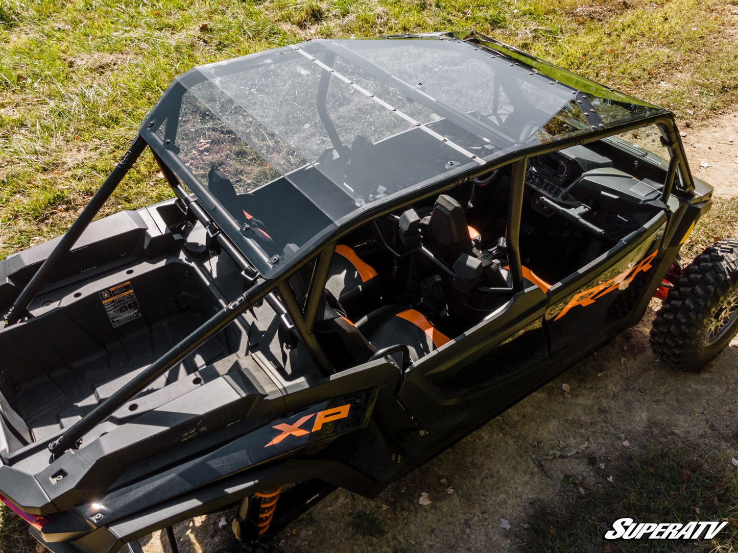 https://media.superatv.com/media/catalog/product/p/o/polaris-rzr-1k-xp4-poly-roof-dark-tint_02.jpg