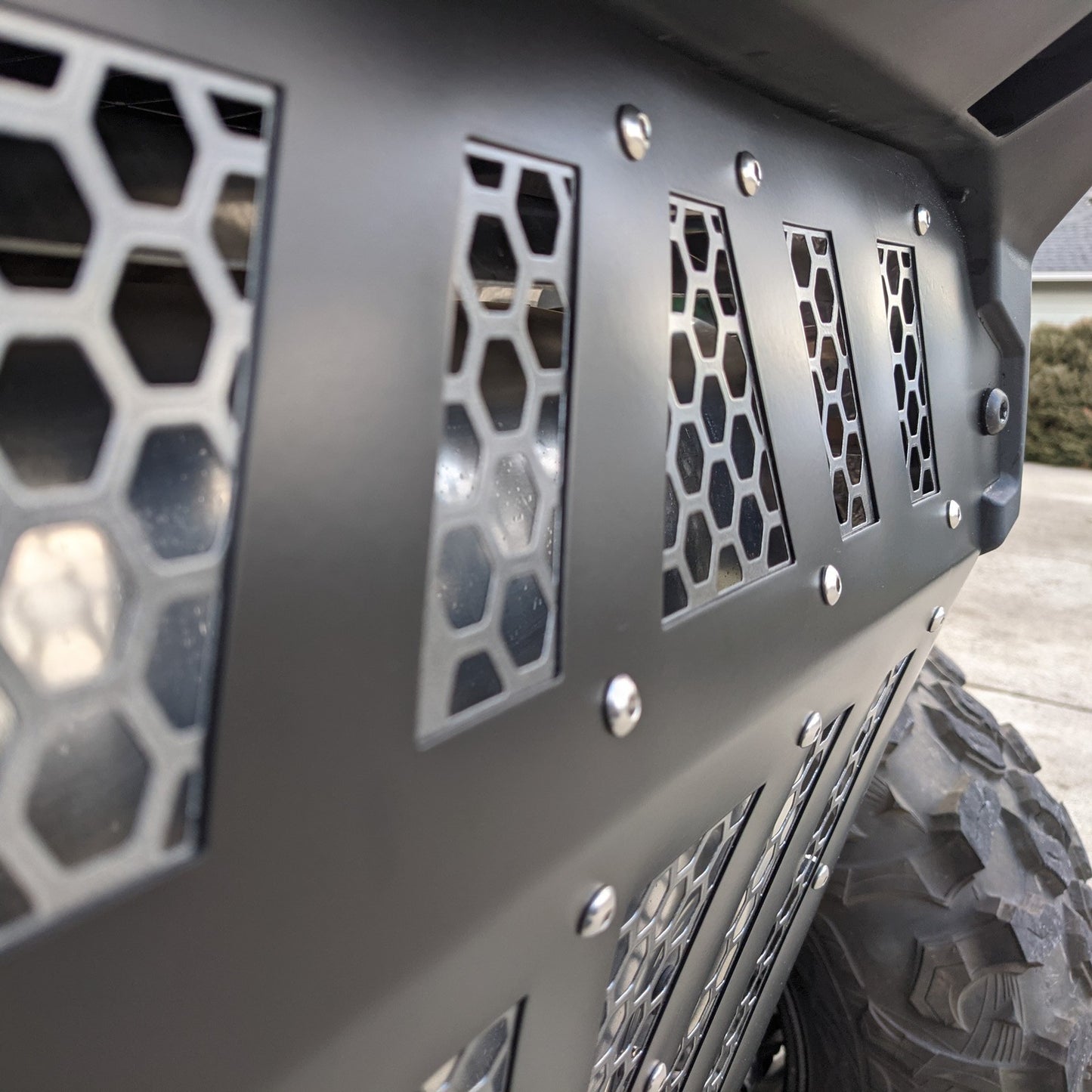 https://50caliberracing.com/10136-extra_large_default/polaris-rzr-pro-xp-vented-exhaust-cover.jpg