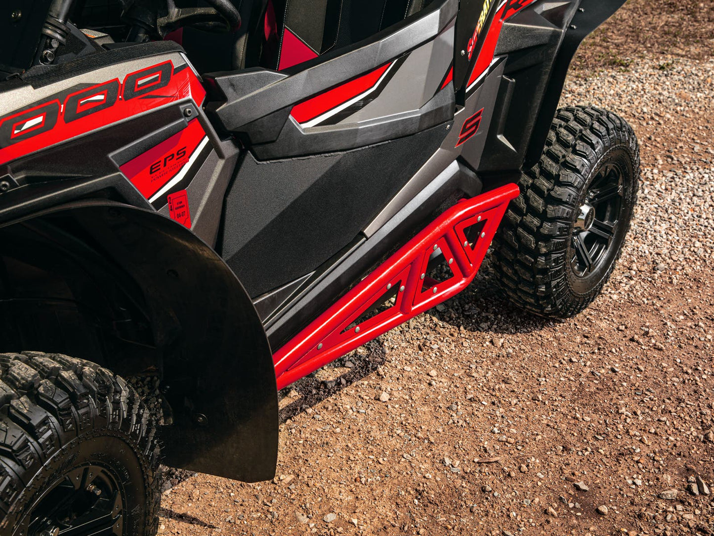 https://media.superatv.com/media/catalog/product/p/o/polaris_rzr_1000_s_heavy_duty_rock_sliders_red_6_2.jpg