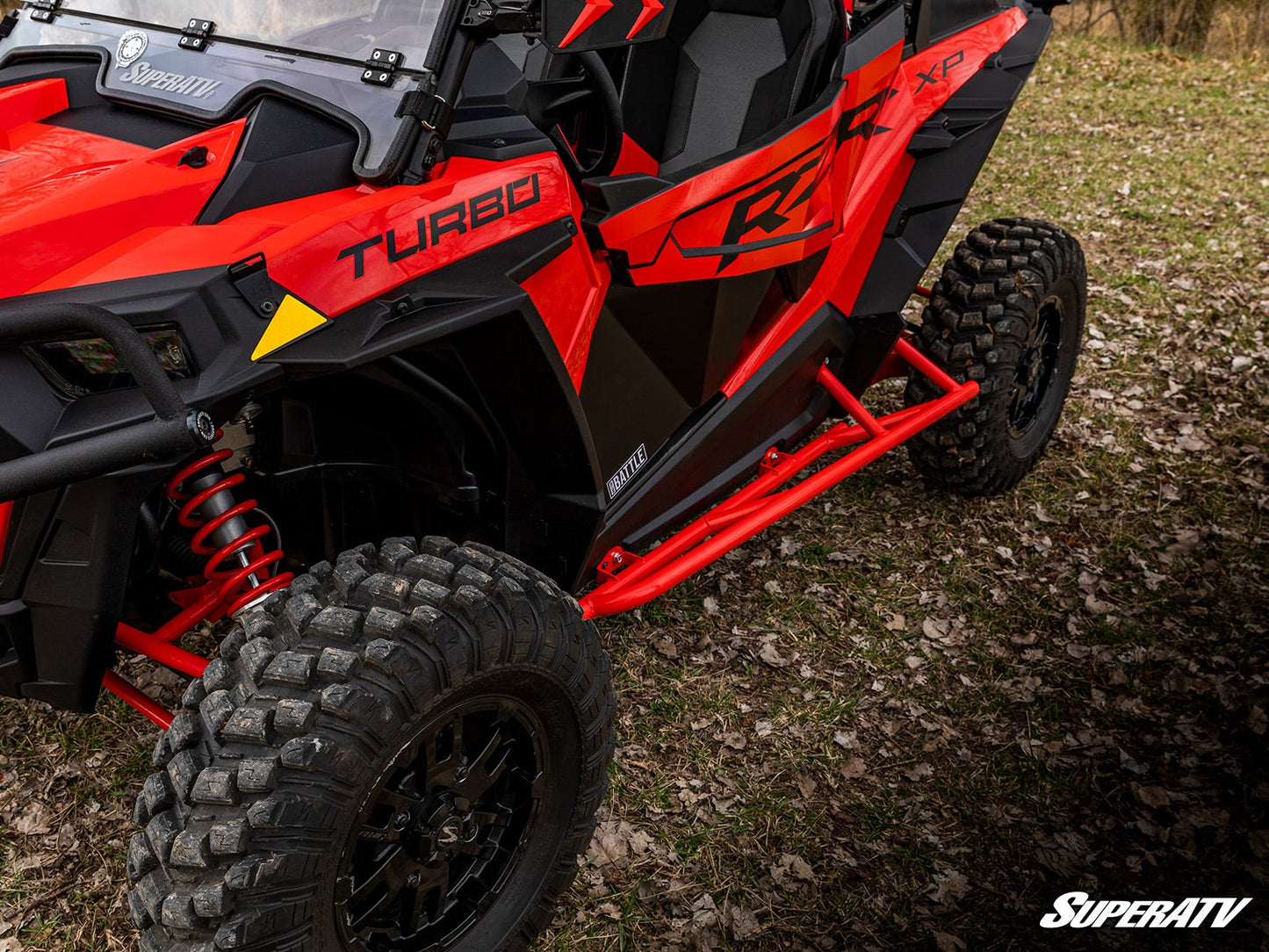 https://media.superatv.com/media/catalog/product/p/o/polaris_rzr_1k_nerf_bars_red_7a_1.jpg?optimize=high&fit=bounds&height=&width=3840&quality=85&auto=webp&format=pjpg
