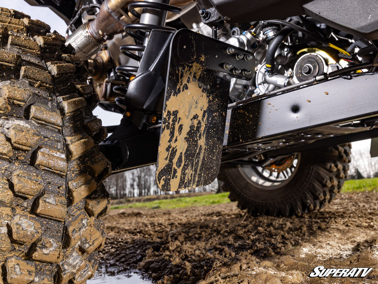 https://media.superatv.com/media/catalog/product/p/o/polaris_rzr_xp_rear_trailing_arm_mud_flap_03.jpg